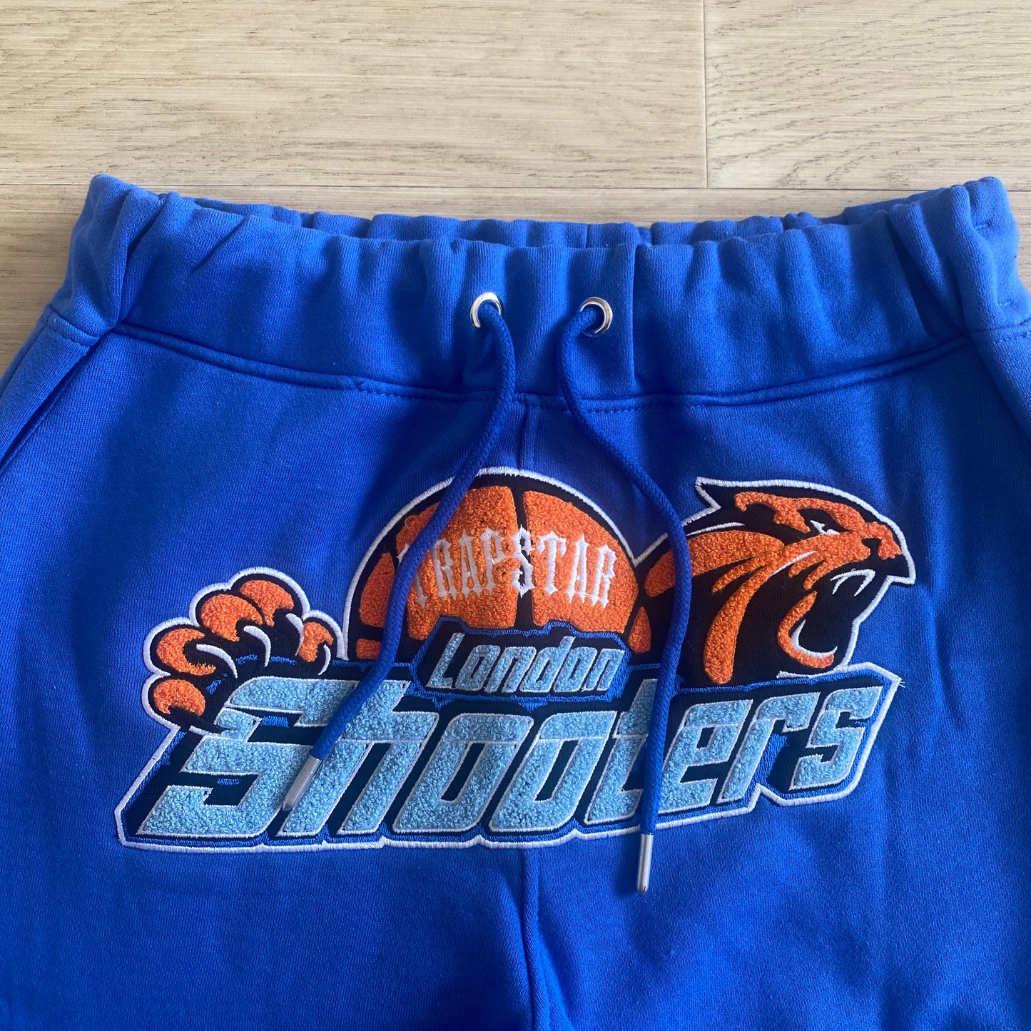 SHOOTERS TRAPSTAR BLUE/ORANGE TRACKSUIT