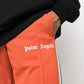 PALM ANGELS ORANGE PANTS
