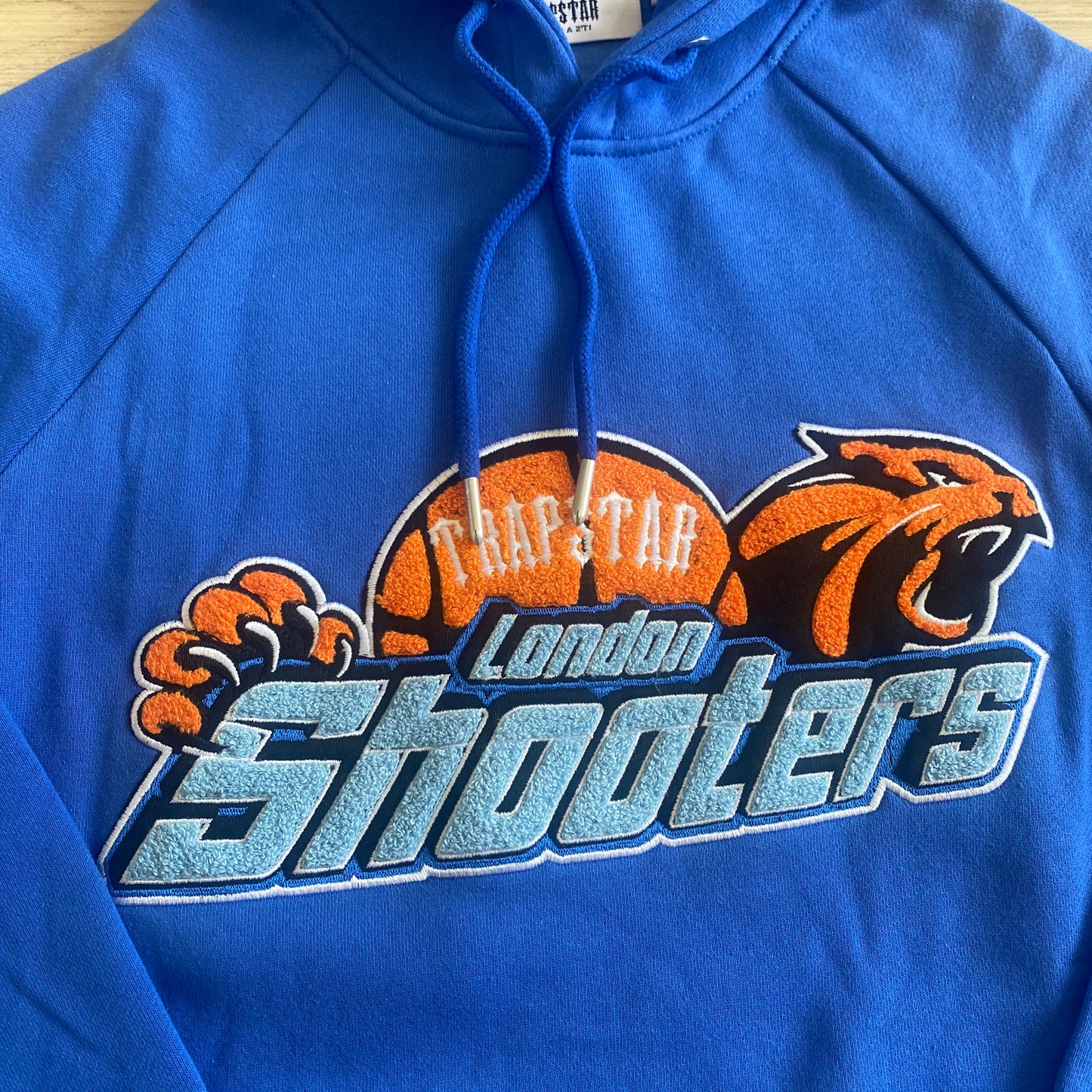 SHOOTERS TRAPSTAR BLUE/ORANGE TRACKSUIT