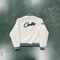 CORTEIZ STADIUM WHITE VARSITY JACKET